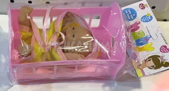 Baby doll in a crib in assortment 218F, 218F